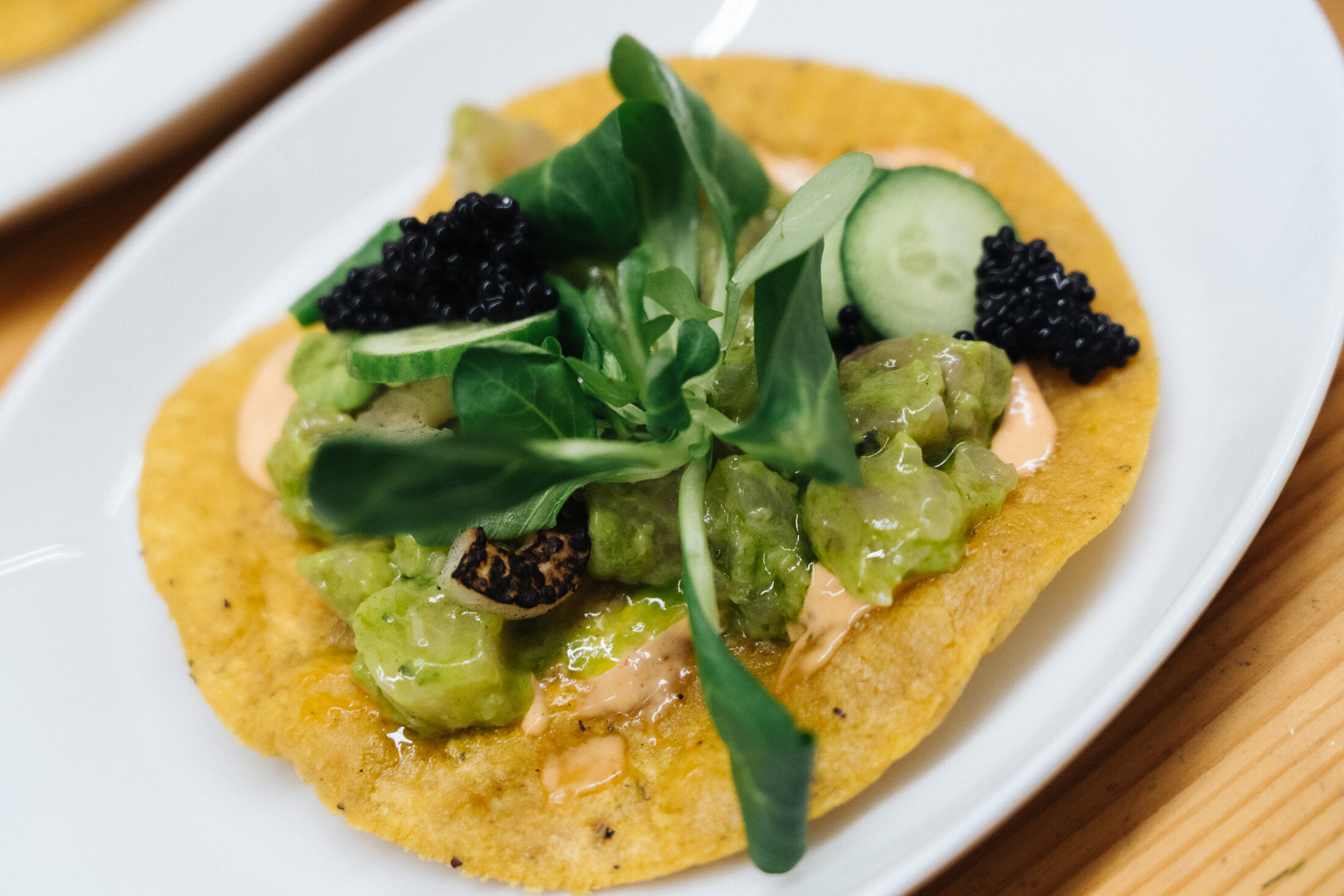 Open quesadilla with guacamole by Tacos Berlin