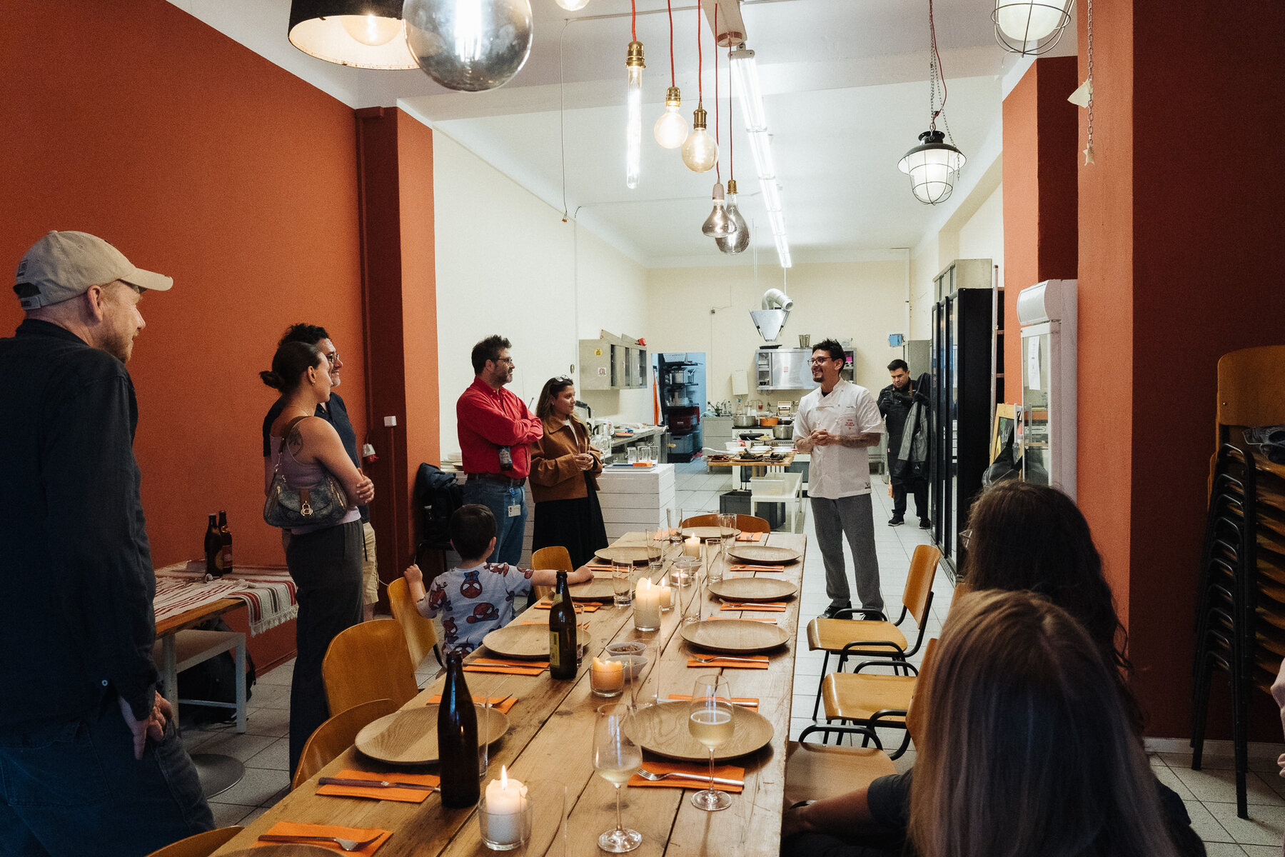 Guests around a Tacos Berlin event table